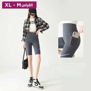 شورت رياضي ضيق مع جيوب للسيدات