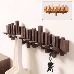 علاقة خشبية قابلة للطي على الحائط بتصميم مفاتيح بيانو