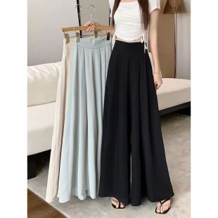 بنطلون واسع الساق بخصر عالٍ وتصميم أنيق للسيدات