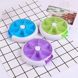 7-Compartment Rotating Round Pill Organizer with Push Button