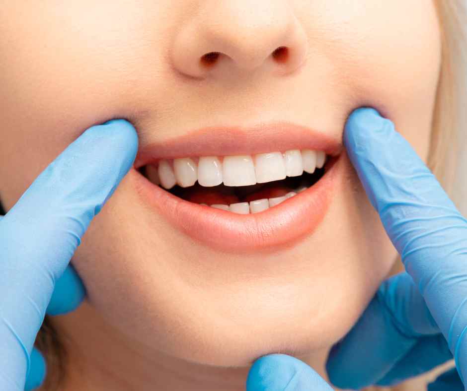 A dentist explaining different teeth whitening options to a patient